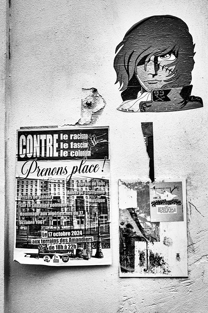 Affiche « Prenons place ! » et portrait dessiné sur un mur